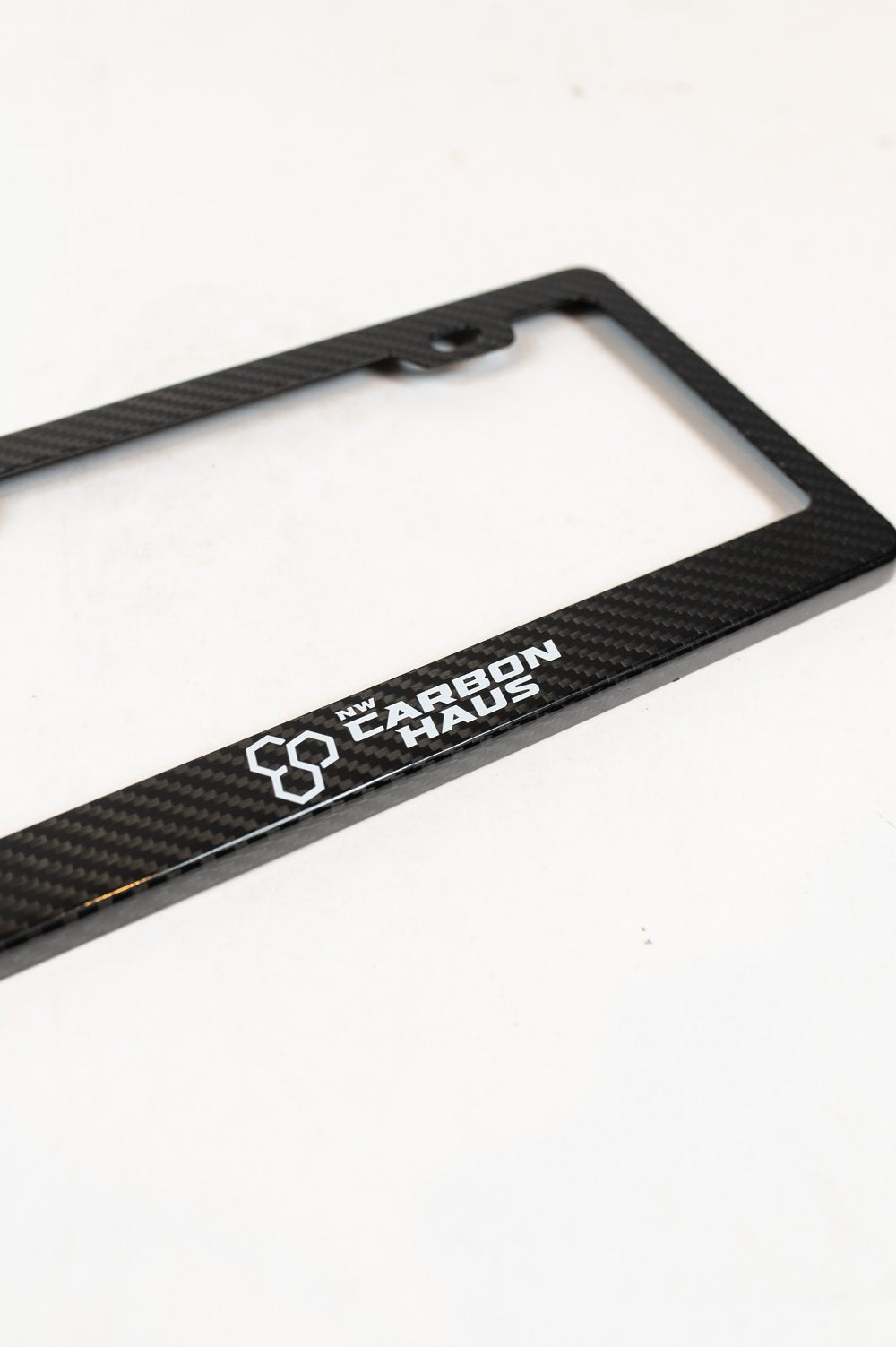 NWCarbon Haus license plate frame